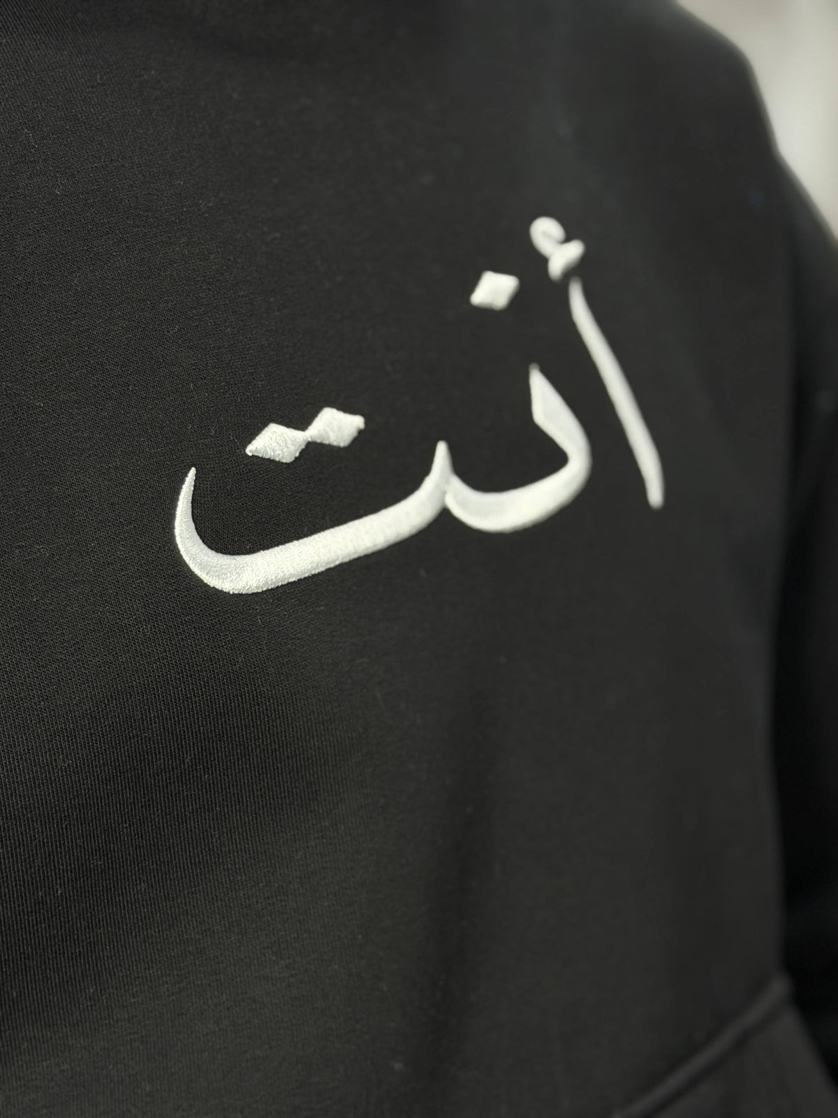 ANT — Essential Hoodie Black